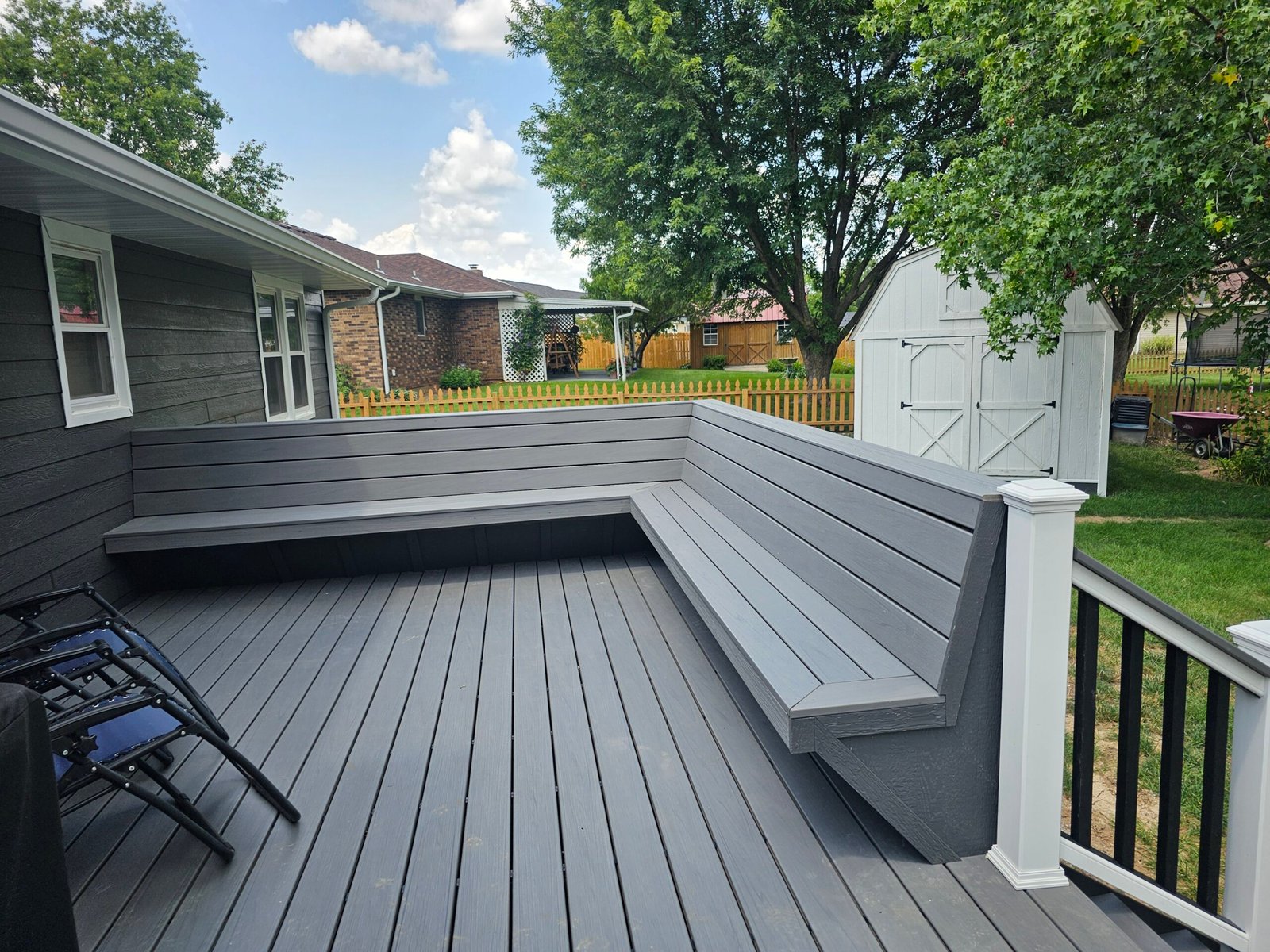 Composite deck with built-in seating in Mexico Missouri